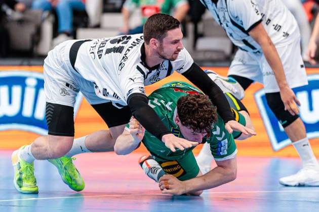 Handball, HBL, TSV GWD Minden - THW Kiel (L-R) Hendrik Pekeler (THW Kiel, 61) im Zweikampf mit Philipp Vorlicek (GWD Minden, 22) GER, GWD Minden vs. THW Kiel, Handball, 1. Bundesliga, 33. Spieltag, Spielzeit 2025 2026, 03.06.2026 GER, GWD Minden vs. THW Kiel, Handball, 1. Bundesliga, 33. Spieltag, Spielzeit 2025 2026, 03.06.2026 Minden Copyright: xEibner-Pressefoto JanxRollingerx EP_JSK
