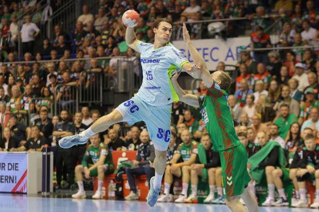 Handball, HBL, SC Magdeburg - VfL Gummersbach 03.06.2026, xtgx, Handball, Daikin HBL, SC Magdeburg - VfL Gummersbach v.l. Miro Schluroff (Gummersbach, 15) wirft Tor, Torschuetze, erzielt Tor, Treffer, scores the goal Magdeburg