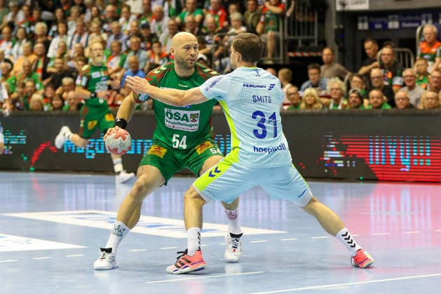 Handball, HBL, SC Magdeburg - VfL Gummersbach #2 03.06.2026, xgox, Handball - Daikin HBL SC Magdeburg - VfL Gummersbach emspor, v.l. Oscar Bergendahl (Magdeburg, 54), Kay Smits (Gummersbach, 31) Zweikampf, Duell, Kampf, tackle Magdeburg