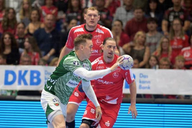 Lasse Bredekjaer Andersson (Fuechse Berlin 11) (am Ball), Olle Forsell Schefvert (MT Melsungen 25), Dainis Kristopans (MT Melsungen 10) (hinten) , GER, MT Melsungen - Fuechse Berlin, Handball, 1. Bundesliga, 33. Spieltag, Saison 2025 2026, 04.06.2026, GER, MT Melsungen - Fuechse Berlin, Handball, 1. Bundesliga, 33. Spieltag, Saison 2025 2026, 04.06.2026 Kassel Copyright: xEibner-Pressefotox xRolandxSippelx EP_RSL