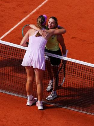 Mirra Andreeva and Maja Chwalinska hug at the net after the final won by Andreeva French Open Tennis, Day Fourteen, Tennis, Roland Garros, Paris, France - 06 Jun 2026Paris Roland Garros France EDITORIAL USE ONLY No use with unauthorised audio, video, data, fixture lists, club league logos or live services. Online in-match use limited to 120 images, no video emulation. No use in betting, games or single club league player publications. Copyright: xJavierxGarcia Shutterstockx 16906570w