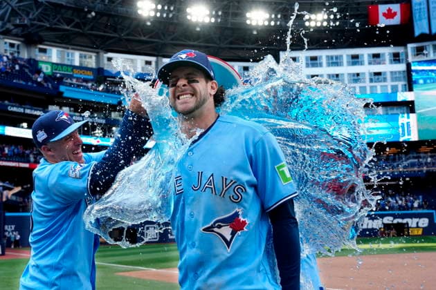 June 6, 2026, Toronto, On, CANADA: Toronto Blue Jays Myles Straw, left, douses teammate Ernie Clement with sports drink following MLB, Baseball Herren, USA baseball action against the Baltimore Orioles, in Toronto, Saturday, June 6, 2026. Canada News - June 6, 2026 - ZUMAc35_ 20260606_zaf_c35_017 Copyright: xFrankxGunnx