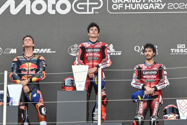 MOTO - MOTO GP - HUNGARY GRAND PRIX 2026 Podium MARQUEZ Marc (spa), Ducati Lenovo Team, Ducati Desmosedici GP26, portrait ACOSTA Pedro (spa), Red Bull KTM Factory Racing, KTM RC16, portraitBAGNAIA Francesco (ita), Ducati Lenovo Team, Ducati Desmosedici GP26, portrait celebrates his third place on podium during the 2026 MotoGP Grand Prix of Hungary , on Balaton Park circuit, from June 5 to 7, in Hungary - Balaton ParkHungary Copyright: xGIGIxSOLDANOx