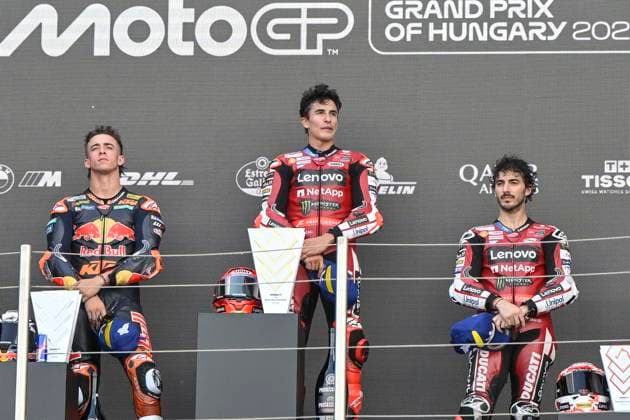MOTO - MOTO GP - HUNGARY GRAND PRIX 2026 Podium MARQUEZ Marc (spa), Ducati Lenovo Team, Ducati Desmosedici GP26, portrait ACOSTA Pedro (spa), Red Bull KTM Factory Racing, KTM RC16, portraitBAGNAIA Francesco (ita), Ducati Lenovo Team, Ducati Desmosedici GP26, portrait celebrates his third place on podium during the 2026 MotoGP Grand Prix of Hungary , on Balaton Park circuit, from June 5 to 7, in Hungary - Balaton ParkHungary Copyright: xGIGIxSOLDANOx