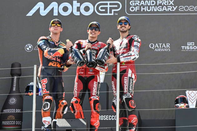MOTO - MOTO GP - HUNGARY GRAND PRIX 2026 Podium MARQUEZ Marc (spa), Ducati Lenovo Team, Ducati Desmosedici GP26, portrait ACOSTA Pedro (spa), Red Bull KTM Factory Racing, KTM RC16, portraitBAGNAIA Francesco (ita), Ducati Lenovo Team, Ducati Desmosedici GP26, portrait celebrates his third place on podium during the 2026 MotoGP Grand Prix of Hungary , on Balaton Park circuit, from June 5 to 7, in Hungary - Balaton ParkHungary Copyright: xGIGIxSOLDANOx