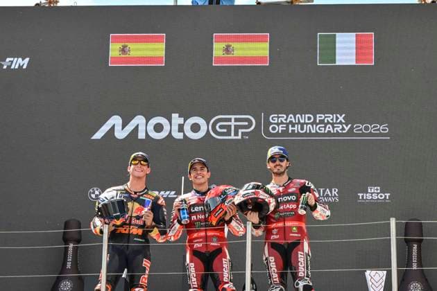 MOTO - MOTO GP - HUNGARY GRAND PRIX 2026 Podium MARQUEZ Marc (spa), Ducati Lenovo Team, Ducati Desmosedici GP26, portrait ACOSTA Pedro (spa), Red Bull KTM Factory Racing, KTM RC16, portraitBAGNAIA Francesco (ita), Ducati Lenovo Team, Ducati Desmosedici GP26, portrait celebrates his third place on podium during the 2026 MotoGP Grand Prix of Hungary , on Balaton Park circuit, from June 5 to 7, in Hungary - Balaton ParkHungary Copyright: xGIGIxSOLDANOx