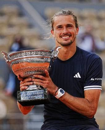 Alexander Zverev wins Roland Garros and celebrates with the Coupe des Mousquetaires trophy French Open Tennis, Day Fifteen, Tennis, Roland Garros, Paris, France - 07 Jun 2026Paris Roland Garros France EDITORIAL USE ONLY No use with unauthorised audio, video, data, fixture lists, club league logos or live services. Online in-match use limited to 120 images, no video emulation. No use in betting, games or single club league player publications. Copyright: xJavierxGarcia Shutterstockx 16906573w