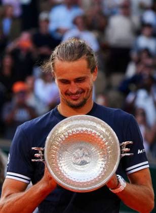 Alexander Zverev wins Roland Garros and celebrates with the Coupe des Mousquetaires trophy French Open Tennis, Day Fifteen, Tennis, Roland Garros, Paris, France - 07 Jun 2026Paris Roland Garros France EDITORIAL USE ONLY No use with unauthorised audio, video, data, fixture lists, club league logos or live services. Online in-match use limited to 120 images, no video emulation. No use in betting, games or single club league player publications. Copyright: xJavierxGarcia Shutterstockx 16906573ah