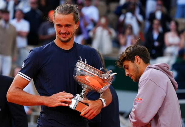 Alexander Zverev wins Roland Garros and celebrates with the Coupe des Mousquetaires trophy after defeating Flavio Cobolli, right French Open Tennis, Day Fifteen, Tennis, Roland Garros, Paris, France - 07 Jun 2026Paris Roland Garros France EDITORIAL USE ONLY No use with unauthorised audio, video, data, fixture lists, club league logos or live services. Online in-match use limited to 120 images, no video emulation. No use in betting, games or single club league player publications. Copyright: xJavierxGarcia Shutterstockx 16906573ai