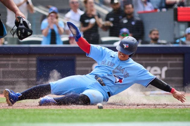 June 7, 2026, Toronto, On, Canada: Toronto Blue Jays Kazuma Okamoto (7) slides in to score on a double by Andro s Gimo nez, not shown, against the Baltimore Orioles during sixth inning MLB, Baseball Herren, USA baseball action in Toronto, on Sunday, June 7, 2026. Canada News - June 7, 2026 - ZUMAc35_ 20260607_zaf_c35_018 Copyright: xSammyxKoganx