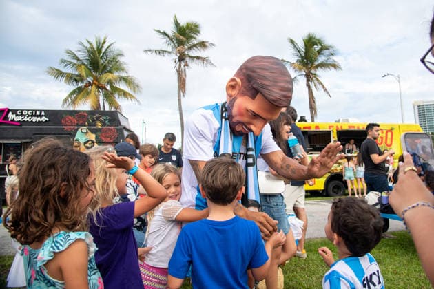 MIAMI, FL - JUNE 09: A person dressed to look like Lionel Messi wearing an Argentina national team, Nationalteam jersey interacts with event attendees on June 9, 2026 at Haulover Park, in Miami, FL. The Food Trucks Tuesdays event at Haulover Park is a weekly free admission community event featuring local food vendors, family-friendly activities, music, and kite flying. Recent events include Panini FIFA World Cup, WM, Weltmeisterschaft, Fussball 2026 Sticker trading, with a goal of helping collectors fill their albums. The performer dressed like Lionel Messi was introduced to attendees as a surprise guest visiting ahead of the 2026 FIFA World Cup. (Photo by Erica Denhoff Icon Sportswire) SOCCER: JUN 09 Food Trucks Tuesdays at Haulover Park EDITORIAL USE ONLY Icon260903