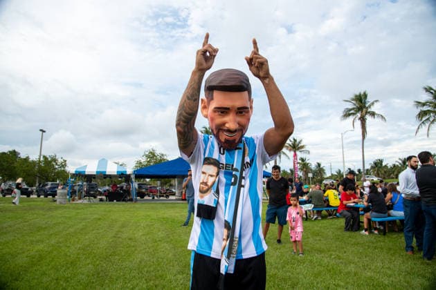 MIAMI, FL - JUNE 09: A person dressed to look like Lionel Messi wearing an Argentina national team, Nationalteam jersey interacts with event attendees on June 9, 2026 at Haulover Park, in Miami, FL. The Food Trucks Tuesdays event at Haulover Park is a weekly free admission community event featuring local food vendors, family-friendly activities, music, and kite flying. Recent events include Panini FIFA World Cup, WM, Weltmeisterschaft, Fussball 2026 Sticker trading, with a goal of helping collectors fill their albums. The performer dressed like Lionel Messi was introduced to attendees as a surprise guest visiting ahead of the 2026 FIFA World Cup. (Photo by Erica Denhoff Icon Sportswire) SOCCER: JUN 09 Food Trucks Tuesdays at Haulover Park EDITORIAL USE ONLY Icon260915