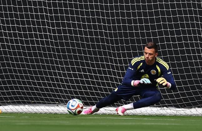 Angus Gunn of Scotland Scotland Training Session and press conference, PK, Pressekonferenz 2026 FIFA World Cup, WM, Weltmeisterschaft, Fussball Football, Atrium Health Performance Park, Charlotte, USA - 10 Jun 2026Charlotte Atrium Health Performance Park United States of America EDITORIAL USE ONLY No use with unauthorised audio, video, data, fixture lists, club league logos or live services. Online in-match use limited to 120 images, no video emulation. No use in betting, games or single club league player publications. Copyright: xMichaelxZemanek Shutterstockx 16919987m
