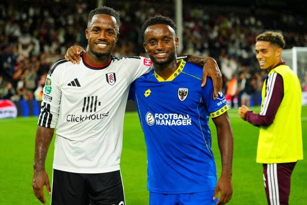 Ryan Sessegnon of Fulham poses for a photo with his brother Steven Sessegnon of AFC Wimbledon at full time as Josh King looks on Fulham v AFC Wimbledon, EFL Carabao Cup, Second Round, Football, Craven Cottage, London, UK - 27 Aug 2026London Craven Cottage United Kingdom EDITORIAL USE ONLY No use with unauthorised audio, video, data, fixture lists, club league logos or live services. Online in-match use limited to 120 images, no video emulation. No use in betting, games or single club league player publications. Copyright: xJavierxGarcia Shutterstockx 17118946cg