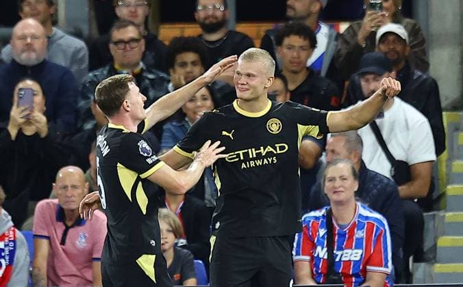 Erling Haaland of Manchester City celebrates scoring the opening goal with team-mate Elliot Anderson of Manchester City Crystal Palace v Manchester City, Premier League Football, Football, Selhurst Park, London, UK - 28 Aug 2026London Selhurst Park United Kingdom EDITORIAL USE ONLY No use with unauthorised audio, video, data, fixture lists, club league logos or live services. Online in-match use limited to 120 images, no video emulation. No use in betting, games or single club league player publications. Copyright: xMichaelxZemanek Shutterstockx 17118951ae