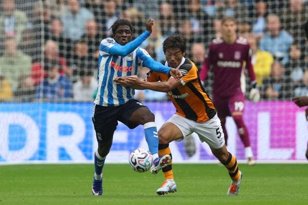Caleb Yirenkyi of Coventry City and Hidemasa Morita of Hull City . Coventry City v Hull City, Premier League Football, Football, Coventry Building Society Arena, Coventry, UK - 29 Aug 2026Coventry Coventry Building Society Arena United Kingdom EDITORIAL USE ONLY No use with unauthorised audio, video, data, fixture lists, club league logos or live services. Online in-match use limited to 120 images, no video emulation. No use in betting, games or single club league player publications. Copyright: xAndrewxFosker Shutterstockx 17119018cg