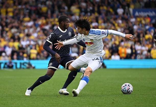 Dango Ouattara of Brentford and Ao Tanaka of Leeds United Leeds United v Brentford, Premier League Football, Football, Elland Road, Leeds, UK - 30 Aug 2026Leeds Elland Road United Kingdom EDITORIAL USE ONLY No use with unauthorised audio, video, data, fixture lists, club league logos or live services. Online in-match use limited to 120 images, no video emulation. No use in betting, games or single club league player publications. Copyright: xAnnaxGowthorpe Shutterstockx 17119080ay