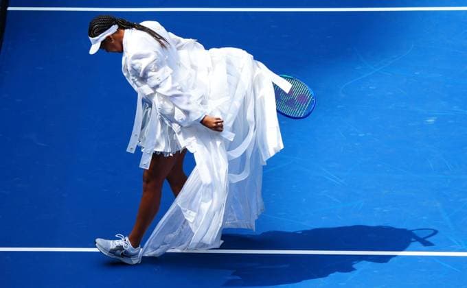 Naomi Osaka almost treads on her dress after walking on to court ahead of her second round match against Katerina Siniakova 2026 US Open, Day Five, USTA Billie Jean King National Tennis Center, New York, USA - 03 Sep 2026New York USTA Billie Jean King National T New York (NY) United States of America EDITORIAL USE ONLY No use with unauthorised audio, video, data, fixture lists, club league logos or live services. Online in-match use limited to 120 images, no video emulation. No use in betting, games or single club league player publications. Copyright: xJavierxGarcia Shutterstockx 17132980e