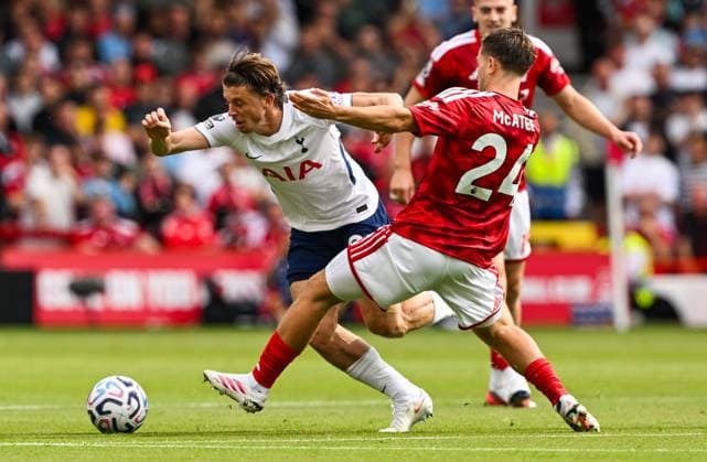 Conor Gallagher of Tottenham Hotspur fouled by James McAtee of Nottingham Forest Nottingham Forest v Tottenham Hotspur, Premier League Football, Football, City Ground, Nottingham, UK - 05 Sep 2026Nottingham City Ground United Kingdom EDITORIAL USE ONLY No use with unauthorised audio, video, data, fixture lists, club league logos or live services. Online in-match use limited to 120 images, no video emulation. No use in betting, games or single club league player publications. Copyright: xGreigxCowie Shutterstockx 17134992y
