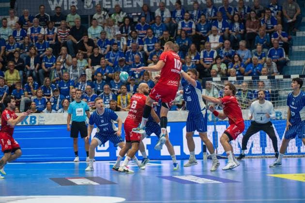 Dainis KriÅ¡topÄns, Rueckraum, (MT Melsungen 10), Å tÄ›pan Zeman, Kreislaeufer, (VfL Gummersbach 66), Erik Balenciaga, Rueckraum, (MT Melsungen 6), VfL Gummersbach vs. MT Melsungen,, Opel Handball Bundesliga, Herren , 3. Spieltag, 05.09.2026 Gummersbach NRW Deutschland