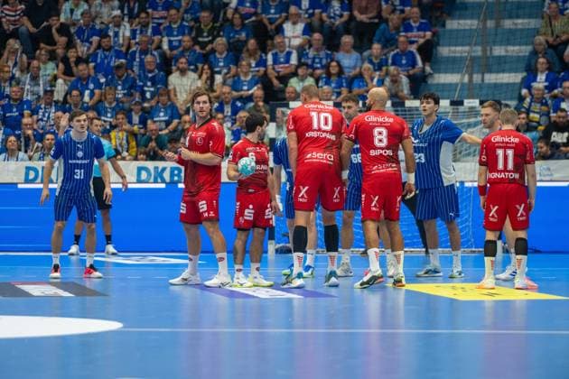 Kay Smits, Rueckraum, (VfL Gummersbach 31), Johannes Golla, Kreislaeufer, (MT Melsungen 14), Dainis KriÅ¡topÄns, Rueckraum, (MT Melsungen 10), VfL Gummersbach vs. MT Melsungen,, Opel Handball Bundesliga, Herren , 3. Spieltag, 05.09.2026 Gummersbach NRW Deutschland