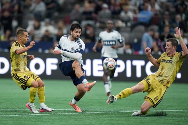 September 5, 2026, Vancouver, Bc, CANADA: Vancouver Whitecaps Brian White, centre, has his shot blocked by St. Louis City s Chris Durkin, right, as Alexandru Matan, left, watches during the second half of an MLS, Fussball Herren, USA soccer match, in Vancouver, on Saturday, Sept. 5, 2026. Canada News - September 5, 2026 - ZUMAc35_ 20260905_zaf_c35_131 Copyright: xDarrylxDyckx