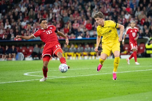 GER, Bavaria, Munich, Fussball, FC Bayern Muenchen - FK Bodo Glimt, at the Allianz Arena, Munich, Champions League, League phase, Matchday 1, September 10, 2026, from left: Jamal Musiala (FC Bayern Muenchen, 10), Villads Nielsen (FK Bodo Glimt, 2), Stuermer im Angriff UEFA regulations prohibit any use of photographs as image sequences and or quasi-video, Copyright: HMB-Media MichaelxNibel