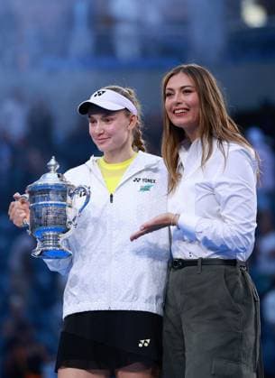 Elena Rybakina of Kazakhstan celebrates with the trophy next to Maria Sharapova 2026 US Open, Day Fourteen, USTA Billie Jean King National Tennis Center, New York, USA - 12 Sep 2026New York USTA Billie Jean King National T New York (NY) United States of America EDITORIAL USE ONLY No use with unauthorised audio, video, data, fixture lists, club league logos or live services. Online in-match use limited to 120 images, no video emulation. No use in betting, games or single club league player publications. Copyright: xEllaxLing Shutterstockx 17140165bt