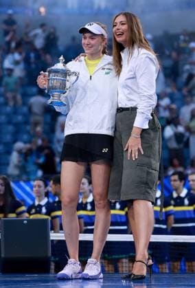 Elena Rybakina of Kazakhstan celebrates with the trophy next to Maria Sharapova 2026 US Open, Day Fourteen, USTA Billie Jean King National Tennis Center, New York, USA - 12 Sep 2026New York USTA Billie Jean King National T New York (NY) United States of America EDITORIAL USE ONLY No use with unauthorised audio, video, data, fixture lists, club league logos or live services. Online in-match use limited to 120 images, no video emulation. No use in betting, games or single club league player publications. Copyright: xEllaxLing Shutterstockx 17140165co