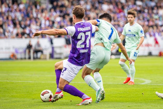 (L-R) Robin Fabinski (VfL Osnabrueck, 27) im Zweikampf mit Josip Brekalo (Hertha BSC, 07) GER, VfL Osnabrueck vs. Hertha BSC, Fussball, 2. Bundesliga, 5. Spieltag, Spielzeit 2026 2027, 13.09.2026 DFL Regulations prohibit any use of photographers as image sequences and or quasi-video. GER, VfL Osnabrueck vs. Hertha BSC, Fussball, 2. Bundesliga, 5. Spieltag, Spielzeit 2026 2027, 13.09.2026 Osnabrueck Copyright: xEibner-Pressefoto JanxRollingerx EP_JSK