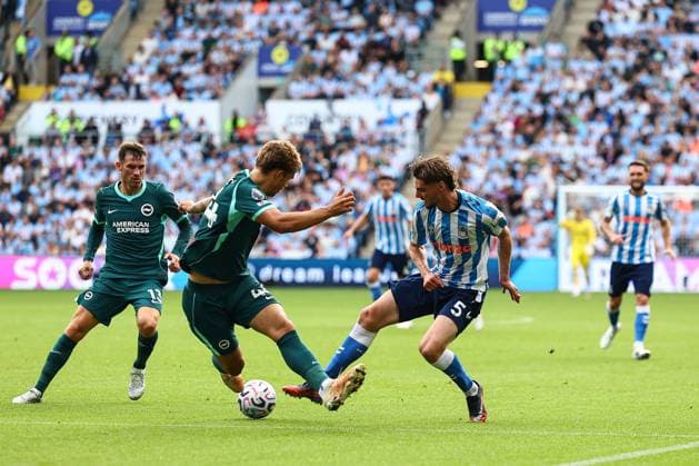 Jack Rudoni of Coventry City battles Coventry City v Brighton and Hove Albion, Premier League, Football, Football, Coventry Building Society Arena, Coventry, UK - 13 Sep 2026Coventry Coventry Building Society Arena United Kingdom EDITORIAL USE ONLY No use with unauthorised audio, video, data, fixture lists, club league logos or live services. Online in-match use limited to 120 images, no video emulation. No use in betting, games or single club league player publications. Copyright: xMichaelxZemanek Shutterstockx 17144597az