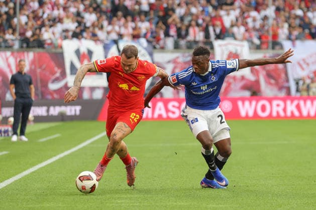 13.09.2026, xtgx, Fussball, 1. Bundesliga, RB Leipzig - Hamburger SV, v.l. David Raum (Leipzig, 22), Patson Daka (Hamburg, 27) Zweikampf, Duell, Kampf, tackle (DFL DFB REGULATIONS PROHIBIT ANY USE OF PHOTOGRAPHS as IMAGE SEQUENCES and or QUASI-VIDEO) Leipzig