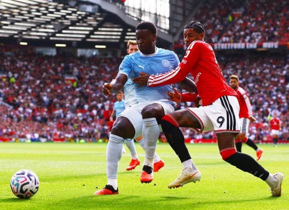 Marcus Rashford of Manchester United, ManU and Marc Guehi of Manchester City Manchester United v Manchester City, Premier League, Football, Football, Old Trafford, Manchester, UK - 13 Sep 2026Manchester Old Trafford United Kingdom EDITORIAL USE ONLY No use with unauthorised audio, video, data, fixture lists, club league logos or live services. Online in-match use limited to 120 images, no video emulation. No use in betting, games or single club league player publications. Copyright: xMattxWest Shutterstockx 17144604ac