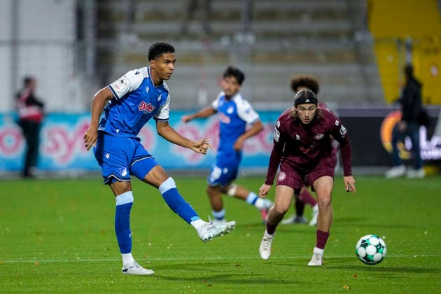 v.li.: Tristan Spranger (TSG II, 13), Bennit Bröger (Köln, 38), Zweikampf, Spielszene, Duell, duel, tackle, tackling, Dynamik, Action, Aktion, 13.09.2026, Sinsheim (Deutschland), Fussball, 3. Liga, TSG 1899 Hoffenheim II - SC Fortuna Köln, DFB DFL REGULATIONS PROHIBIT ANY USE OF PHOTOGRAPHS AS IMAGE SEQUENCES AND OR QUASI-VIDEO.