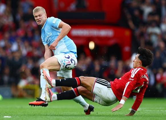 Erling Haaland of Manchester City and Lisandro Martinez of Manchester United, ManU Manchester United v Manchester City, Premier League, Football, Football, Old Trafford, Manchester, UK - 13 Sep 2026Manchester Old Trafford United Kingdom EDITORIAL USE ONLY No use with unauthorised audio, video, data, fixture lists, club league logos or live services. Online in-match use limited to 120 images, no video emulation. No use in betting, games or single club league player publications. Copyright: xMattxWest Shutterstockx 17144604bn