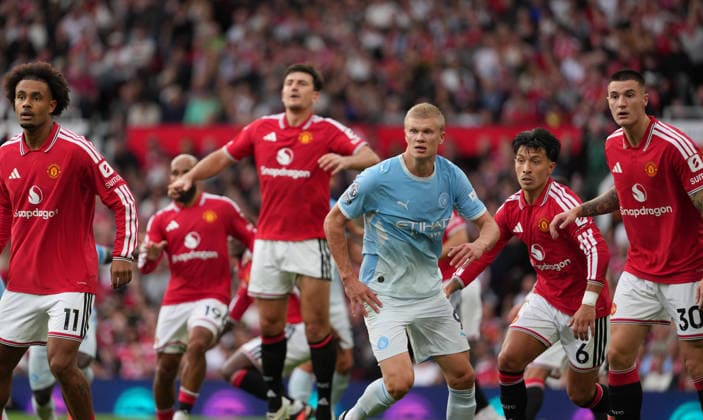 Manchester United, ManU FC v Manchester City FC - Premier League - Season 2026 2027 - Matchday 4 - Old Trafford Manchester CityÕs Erling Haaland is headily marked during the Manchester United v Manchester City Premier League match at Old Trafford , Manchester , Season 26 27, 13 September 2026 EDITORIAL USE ONLY. No use with unauthorized audio, video, data, fixture lists, club league logos or live services. Online in-match use limited to 45 images, no video emulation. No use in betting, games or single club league player publications Manchester United Kingdom