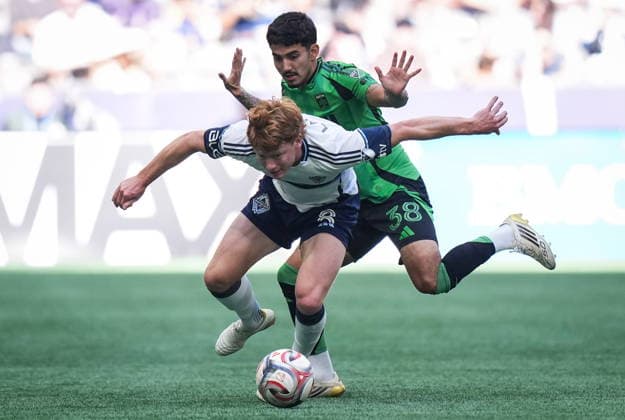 September 13, 2026, Vancouver, Bc, CANADA: Vancouver Whitecaps Oliver Larraz (8) and Austin FC s Ervin Torres (38) vie for the ball during the first half of an MLS, Fussball Herren, USA soccer match, in Vancouver, on Sunday, Sept. 13, 2026. Canada News - September 13, 2026 - ZUMAc35_ 20260913_zaf_c35_128 Copyright: xDarrylxDyckx