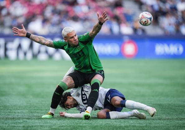 September 13, 2026, Vancouver, Bc, CANADA: Austin FC s Christian Ramirez, front, and Vancouver Whitecaps Jeevan Badwal collide during the second half of an MLS, Fussball Herren, USA soccer match, in Vancouver, on Sunday, Sept. 13, 2026. Canada News - September 13, 2026 - ZUMAc35_ 20260913_zaf_c35_168 Copyright: xDarrylxDyckx