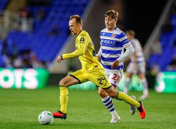 Mikkel Damsgaard of Brentford gets away from Josh Stokes of Reading Reading v Brentford, EFL Carabao Cup, Football, The Select Car Leasing Stadium, UK - 15 Sep 2026Reading The Select Car Leasing Stadium United Kingdom EDITORIAL USE ONLY No use with unauthorised audio, video, data, fixture lists, club league logos or live services. Online in-match use limited to 120 images, no video emulation. No use in betting, games or single club league player publications. Copyright: xMattxImpey Shutterstockx 17152698ab