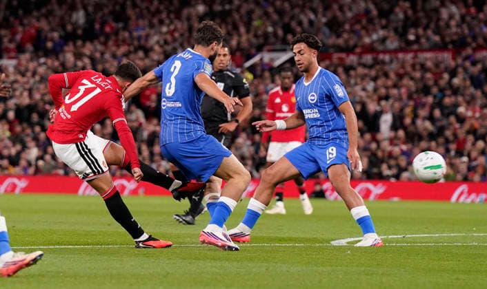 Manchester, England, 16th September 2026. Shea Lacey of Manchester United, ManU (L) scores the opening goal during the Manchester United vs Brighton and Hove Albion Carabao Cup match at Old Trafford, Manchester. Picture credit should read: Andrew Yates Sportimage EDITORIAL USE ONLY. No use with unauthorised audio, video, data, fixture lists, club league logos or live services. Online in-match use limited to 120 images, no video emulation. No use in betting, games or single club league player publications. SPI_002_AY_MAN_UTD_BRIGHTON SPI-5001-0002