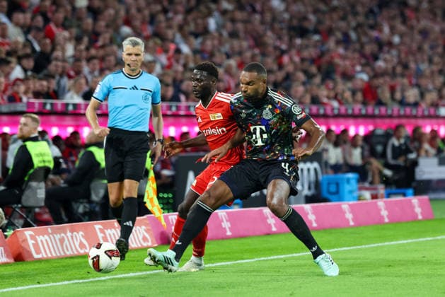 Jonathan Tah (FC Bayern Muenchen, 04) mit Emmanuel Latte Lath (1. FC Union Berlin, 29), GER, FC Bayern Muenchen vs. 1. FC Union Berlin, Fussball, Bundesliga, 4. Spieltag, Saison 2026 2027, 18.09.2026, DFL DFB REGULATIONS PROHIBIT ANY USE OF PHOTOGRAPHS as IMAGE SEQUENCES and or QUASI-VIDEO, GER, FC Bayern Muenchen vs. 1. FC Union Berlin, Fussball, Bundesliga, 4. Spieltag, Saison 2026 2027, 18.09.2026 Muenchen Copyright: xEibner-Pressefoto JennixMaulx EP_JML