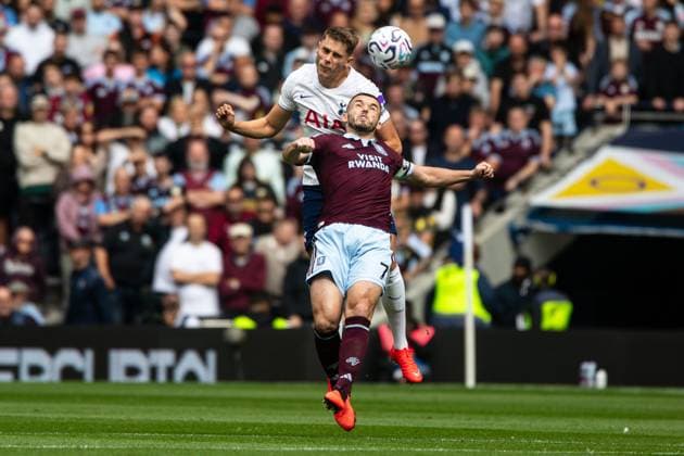 Micky van de Ven of Tottenham Hotspur heads the ball over John McGinn of Aston Villa Tottenham Hotspur v Aston Villa, Premier League, Football, Tottenham Hotspur Stadium, London, UK - 19 Sep 2026London Tottenham Hotspur Stadium United Kingdom EDITORIAL USE ONLY No use with unauthorised audio, video, data, fixture lists, club league logos or live services. Online in-match use limited to 120 images, no video emulation. No use in betting, games or single club league player publications. Copyright: xSeanxTroup Shutterstockx 17158343j