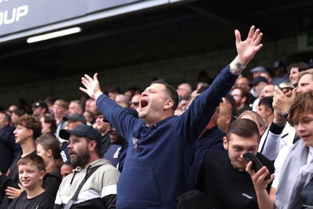 Millwall fans at the Millwall v West Ham EFL Championship match at The New Den. Millwall v West Ham United, EFL Sky Bet Championship, Football, The Den, London, UK - 19 Sep 2026London The Den United Kingdom EDITORIAL USE ONLY No use with unauthorised audio, video, data, fixture lists, club league logos or live services. Online in-match use limited to 120 images, no video emulation. No use in betting, games or single club league player publications. Paul M Copyright: xPaulxMarriott Shutterstockx 17158320aa