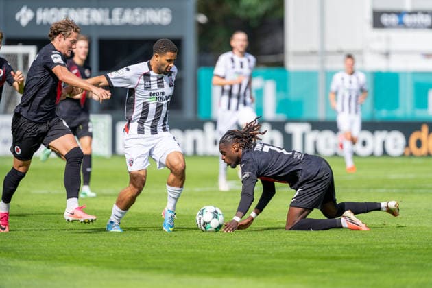 Tobias Eisenhuth (Viktoria Köln, 06) haelt Keanan Bennetts (FC Ingolstadt 04, 18) und Yannick Tonye (Viktoria Köln, 07) spielt den Ball mit der Hand FC Viktoria Köln vs. FC Ingolstadt 04, Fussball, 3.Liga, 7.Spieltag, Saison 2026 27, 19.09.2026, DFL REGULATIONS PROHIBIT ANY USE OF PHOTOGRAPHS AS IMAGE SEQUENCES AND OR QUASI-VIDEO, FC Viktoria Köln vs. FC Ingolstadt 04, Fussball, 3.Liga, 7.Spieltag, Saison 2026 27, 19.09.2026 Köln Copyright: xEibner-Pressefoto LukasxBaldygax EP_LBA