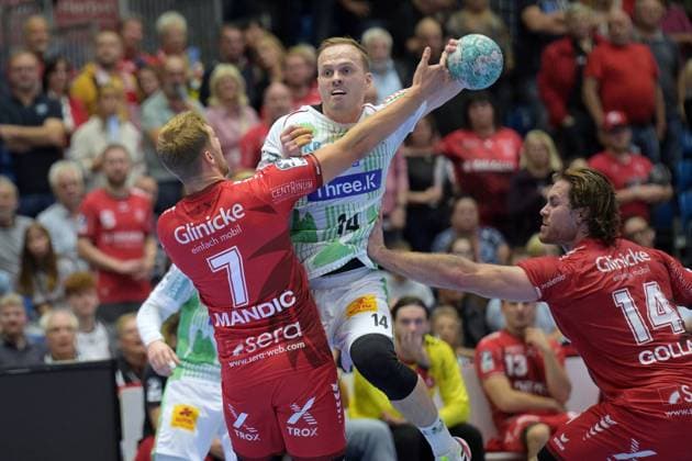 Omar Ingi Magnusson (SC Magdeburg 14) beim Wurf; Emre Boeyuekata (KSV Hessen Kassel 7), Johannes Golla (MT Melsungen 14) (R) , GER, MT Melsungen - SC Magdeburg, Handball, 1. Bundesliga, 5. Spieltag, Saison 2026 2027, 20.09.2026, GER, MT Melsungen - SC Magdeburg, Handball, 1. Bundesliga, 5. Spieltag, Saison 2026 2027, 20.09.2026 Kassel Copyright: xEibner-Pressefotox xRolandxSippelx EP_RSL