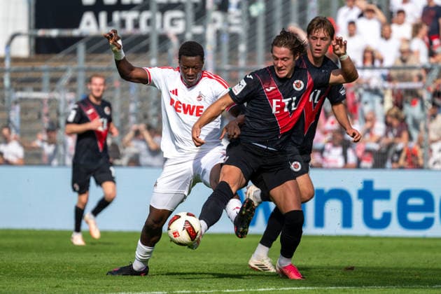 Zweikampf zwischen Ragnar Ache (1. FC Koeln, 09) und Tobias Eisenhut (Viktoria Koeln, 06). Dabei Tim Kloss (Viktoria Koeln, 18). FC Viktoria Koeln vs. FC Hansa Rostock , Fussball, 3. Liga, 05. Spieltag, Saison 2026 2027, 11.09.2026 DFL DFB Regulations prohibit any use of Photographs as image sequences and or Quasivideo FC Viktoria Koeln vs. FC Hansa Rostock, Fussball, 3. Liga, 05. Spieltag, Saison 2026 2027, 11.09.2026 Koeln Copyright: xEibner-Pressefoto ThomasxHaeslerx EP_THR