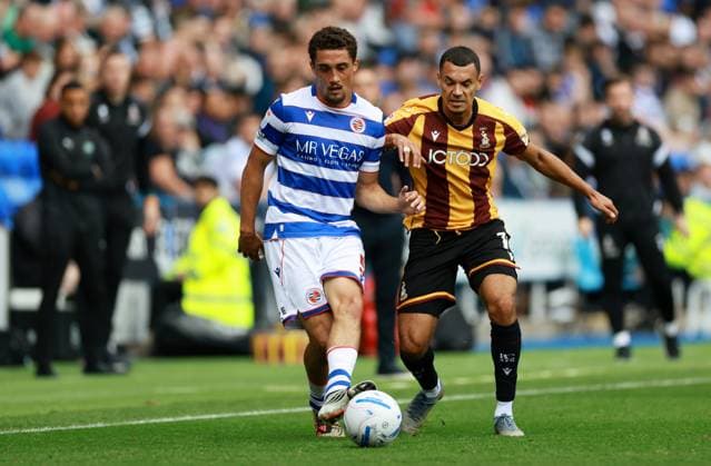 Haydon Roberts of Reading and Kayden Jackson of Bradford City. Reading v Bradford City, EFL Sky Bet League One, Football, Select Car Leasing Stadium, Reading, UK - 03 Oct 2026Reading Select Car Leasing Stadium United Kingdom EDITORIAL USE ONLY No use with unauthorised audio, video, data, fixture lists, club league logos or live services. Online in-match use limited to 120 images, no video emulation. No use in betting, games or single club league player publications. Copyright: xJamesxMarsh Shutterstockx 17183697bb