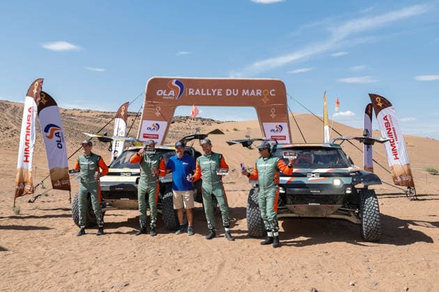 W2RC - RALLYE DU MAROC 2026 223 MORAES Lucas (bra), MORENO Pablo (esp), Dacia Sandrider, The Dacia Sandriders, FIA W2RC, ULT T1+, action, 299 AL ATTIYAH Nasser (qat), LURQUIN Fabian (bel), Dacia Sandrider, The Dacia Sandriders, FIA W2RC, ULT T1+, action Finisher podium, portrait during the Stage 5 of the Rallye du Maroc 2026, 4th round of the 2026 WR2C Championship from October 3, 2026 around Zagora, Morocco - AgadirMorocco Copyright: xPauloxMariax
