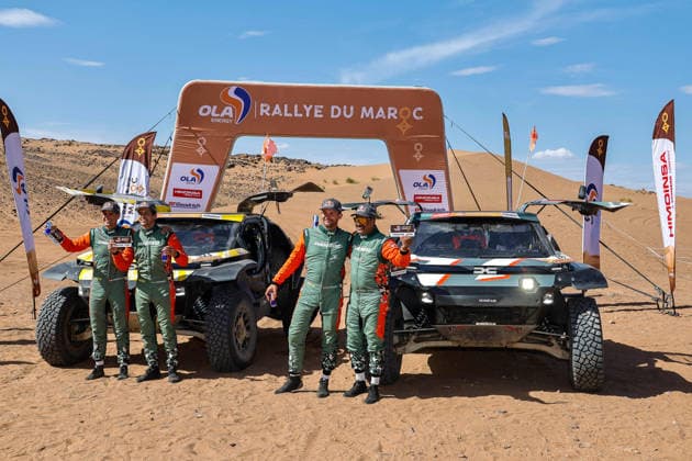 W2RC - RALLYE DU MAROC 2026 223 MORAES Lucas (bra), MORENO Pablo (esp), Dacia Sandrider, The Dacia Sandriders, FIA W2RC, ULT T1+, action, 299 AL ATTIYAH Nasser (qat), LURQUIN Fabian (bel), Dacia Sandrider, The Dacia Sandriders, FIA W2RC, ULT T1+, action Finisher podium, portrait during the Stage 5 of the Rallye du Maroc 2026, 4th round of the 2026 WR2C Championship from October 3, 2026 around Zagora, Morocco - AgadirMorocco Copyright: xPauloxMariax