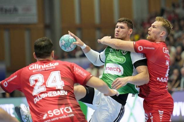 Sebastian Heymann (TSV Hannover-Burgdorf 11) (am Ball), David Mandic (MT Melsungen 7) (R), Daniel Dujshebaev (MT Melsungen 24) , GER, MT Melsungen - TSV Hannover-Burgdorf, Handball, 1. Bundesliga, 7. Spieltag, Saison 2026 2027, 03.10.2026, GER, MT Melsungen - Hannover-Burgdorf, Handball, 1. Bundesliga, 7. Spieltag, Saison 2026 2027, 03.10.2026 Kassel Copyright: xEibner-Pressefotox xRolandxSippelx EP_RSL